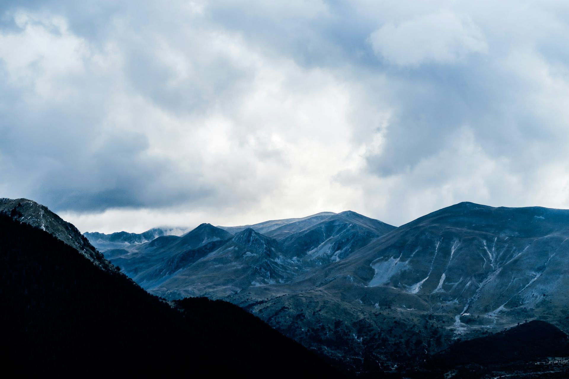 Photograph of a mountain valley in Metsovo, Greece by Jason Blackeye via Unsplash (2016)