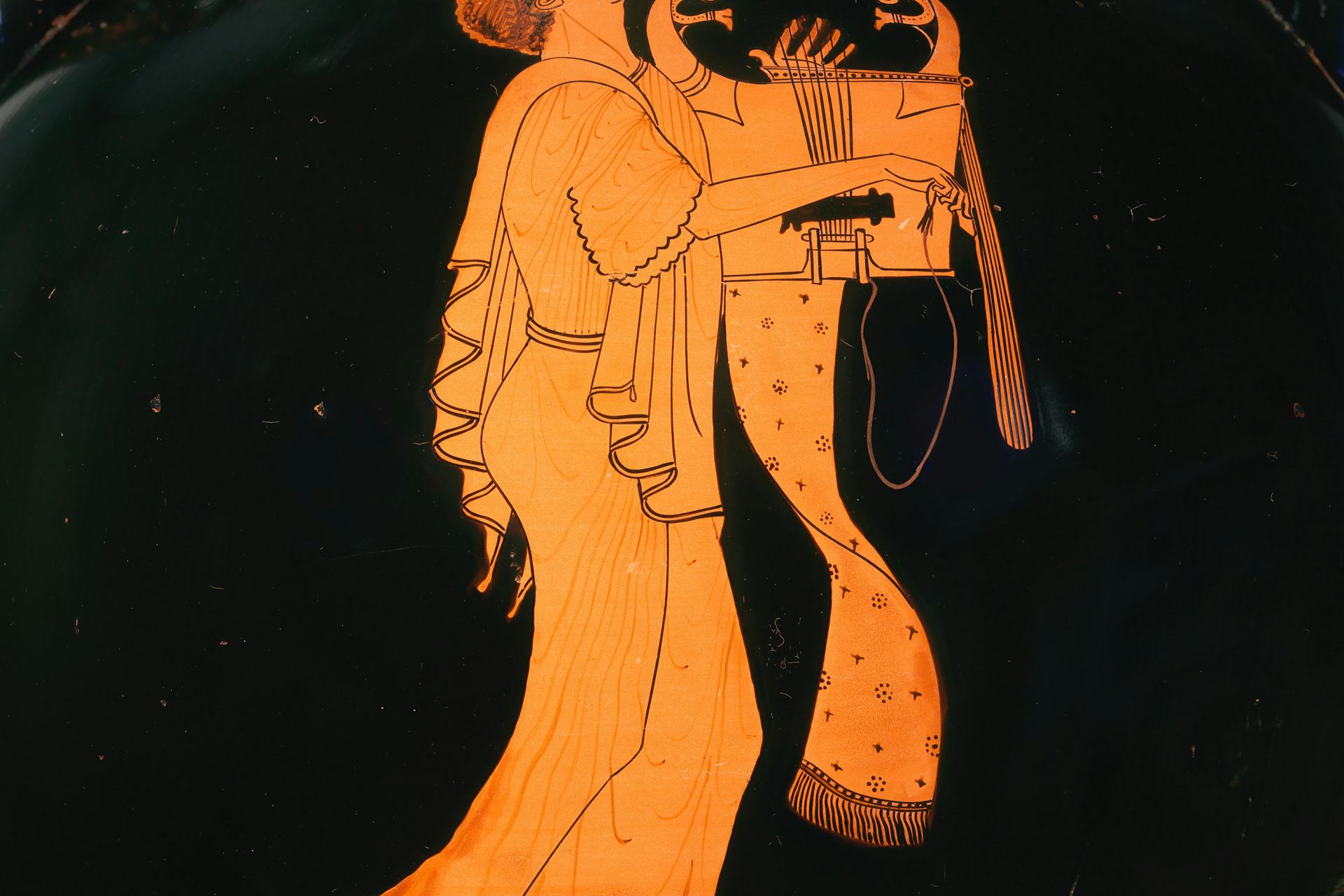 Vase painting of a young man singing and playing the cithara by the Berlin Painter
