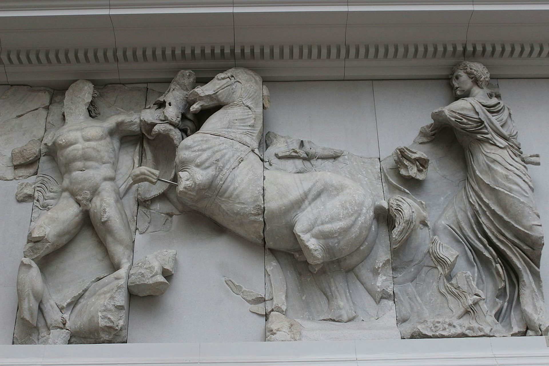 Relief from the Pergamon Altar showing Helios (right) fighting the Giants (2nd century BCE). 