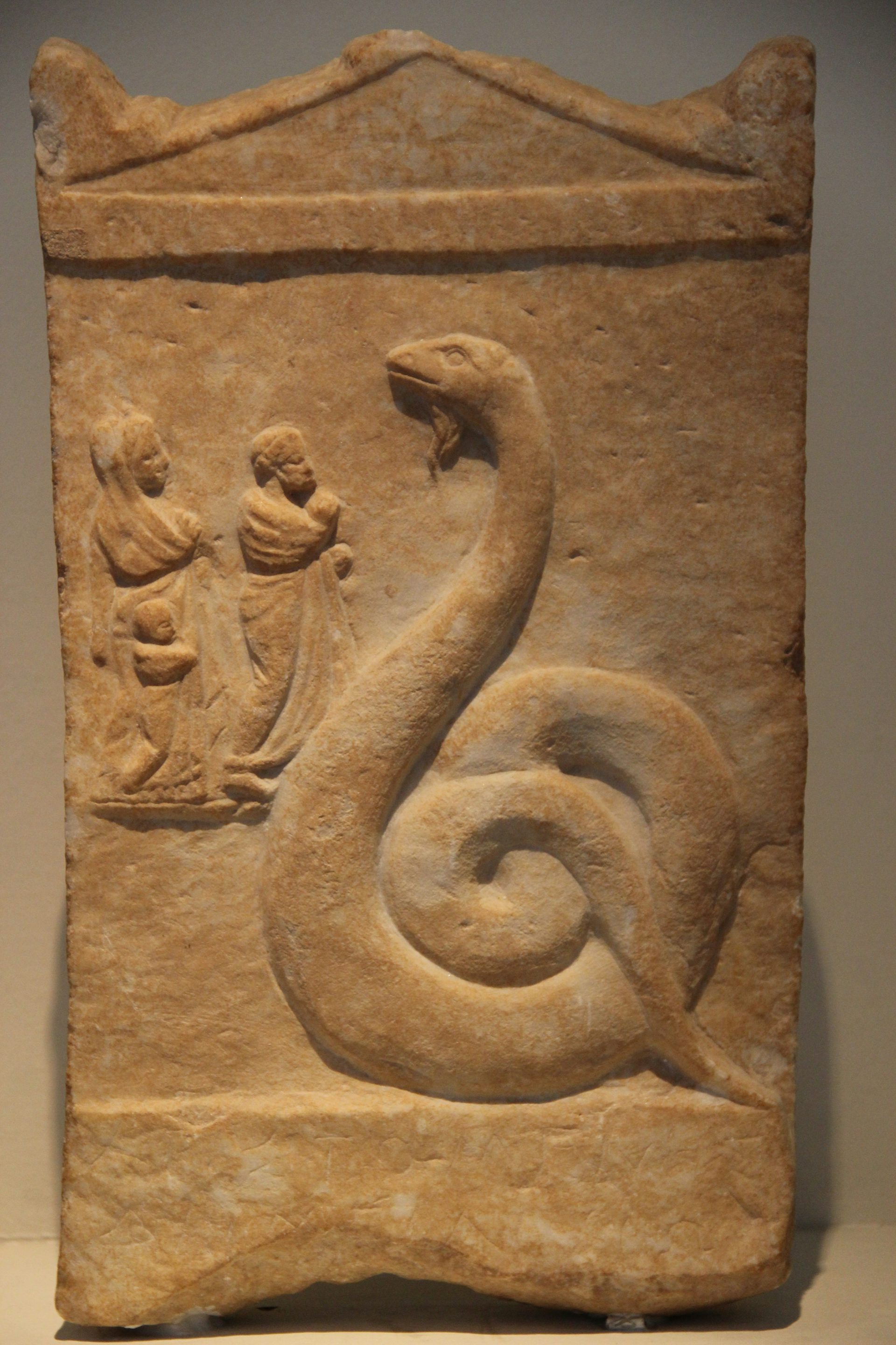 Votive relief of Zeus Melichios as a snake
