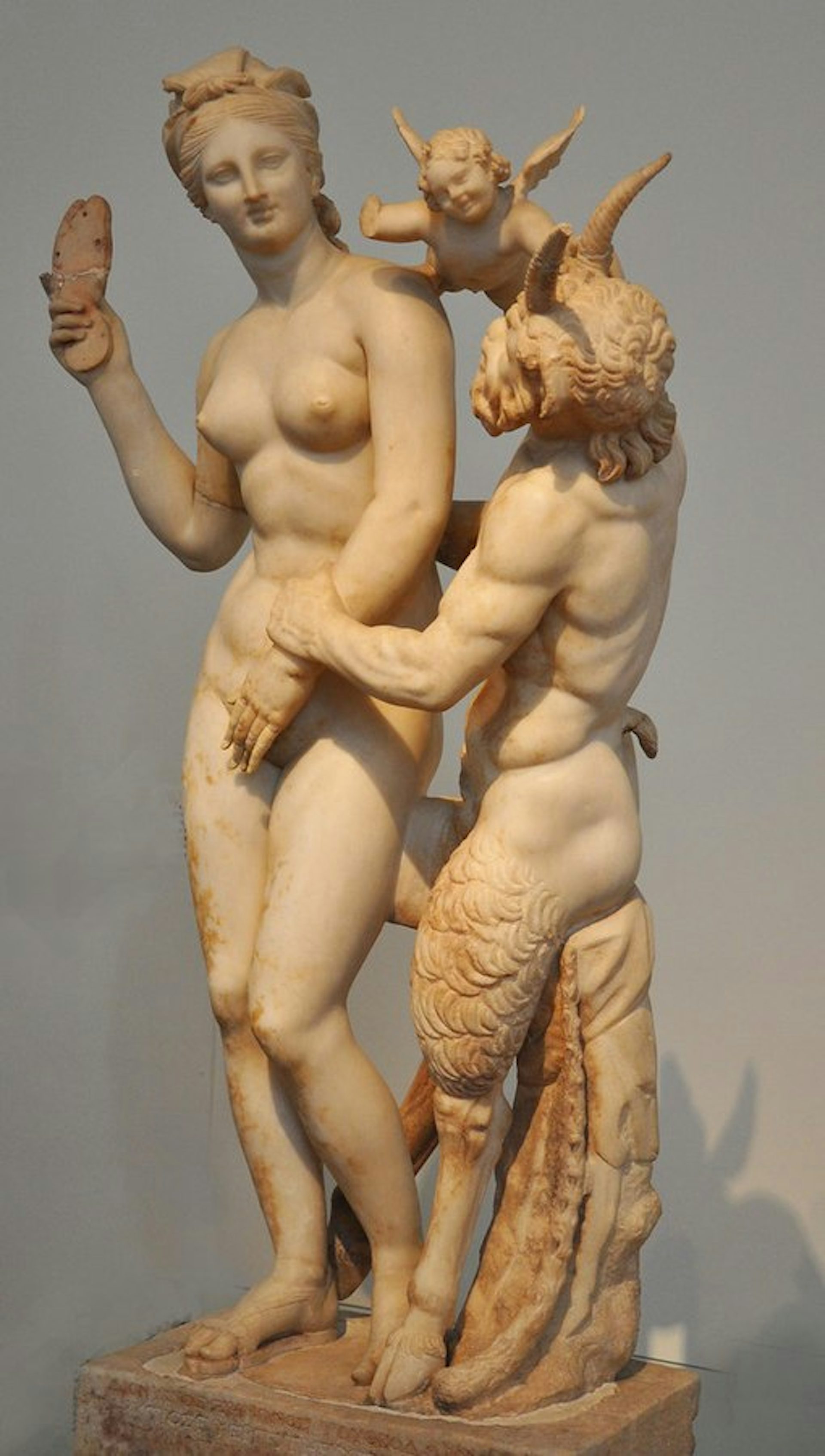 Marble statue of Pan, Aphrodite, and Eros