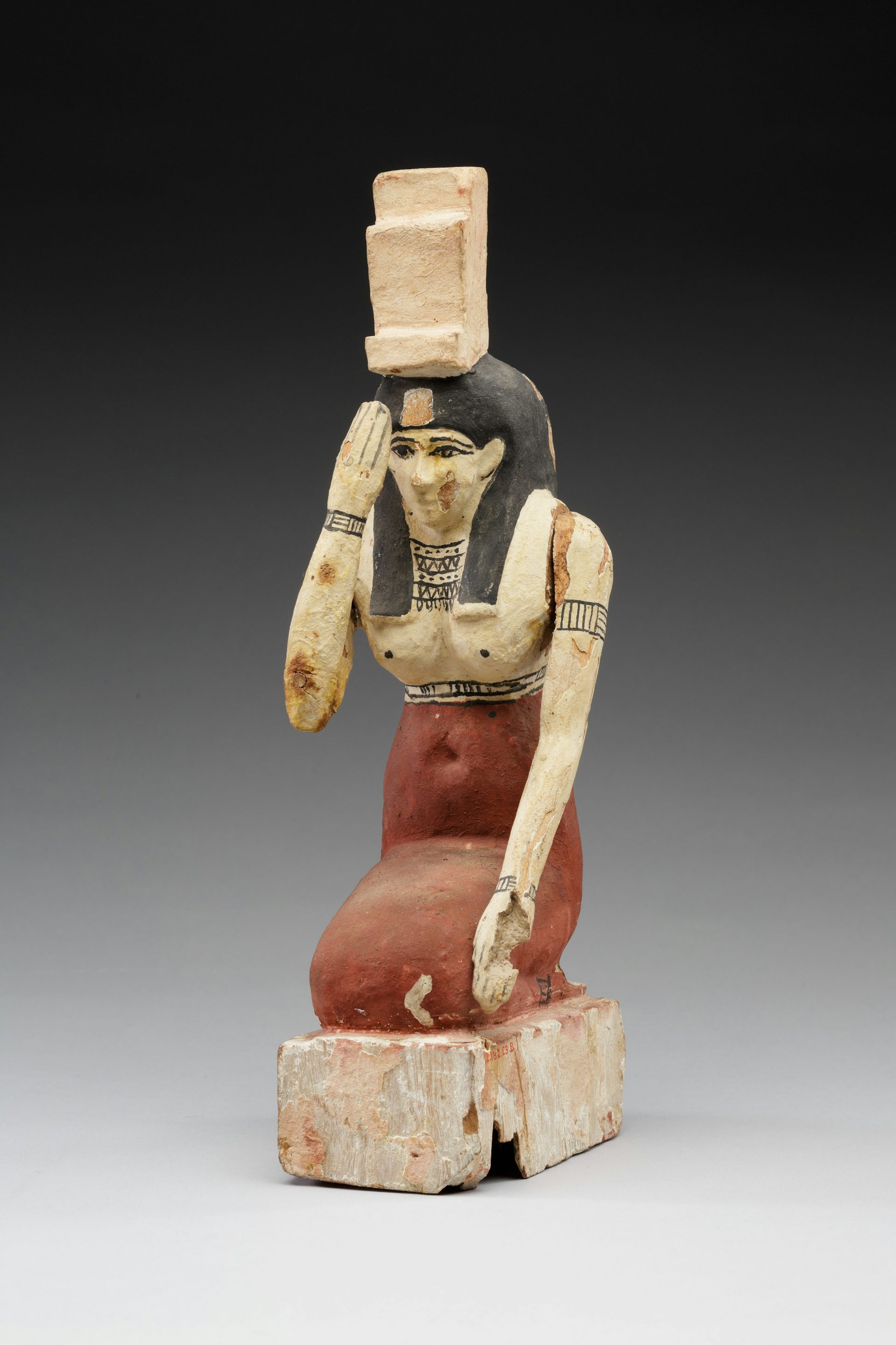wooden statue of Isis in mourning (332–30 BCE)