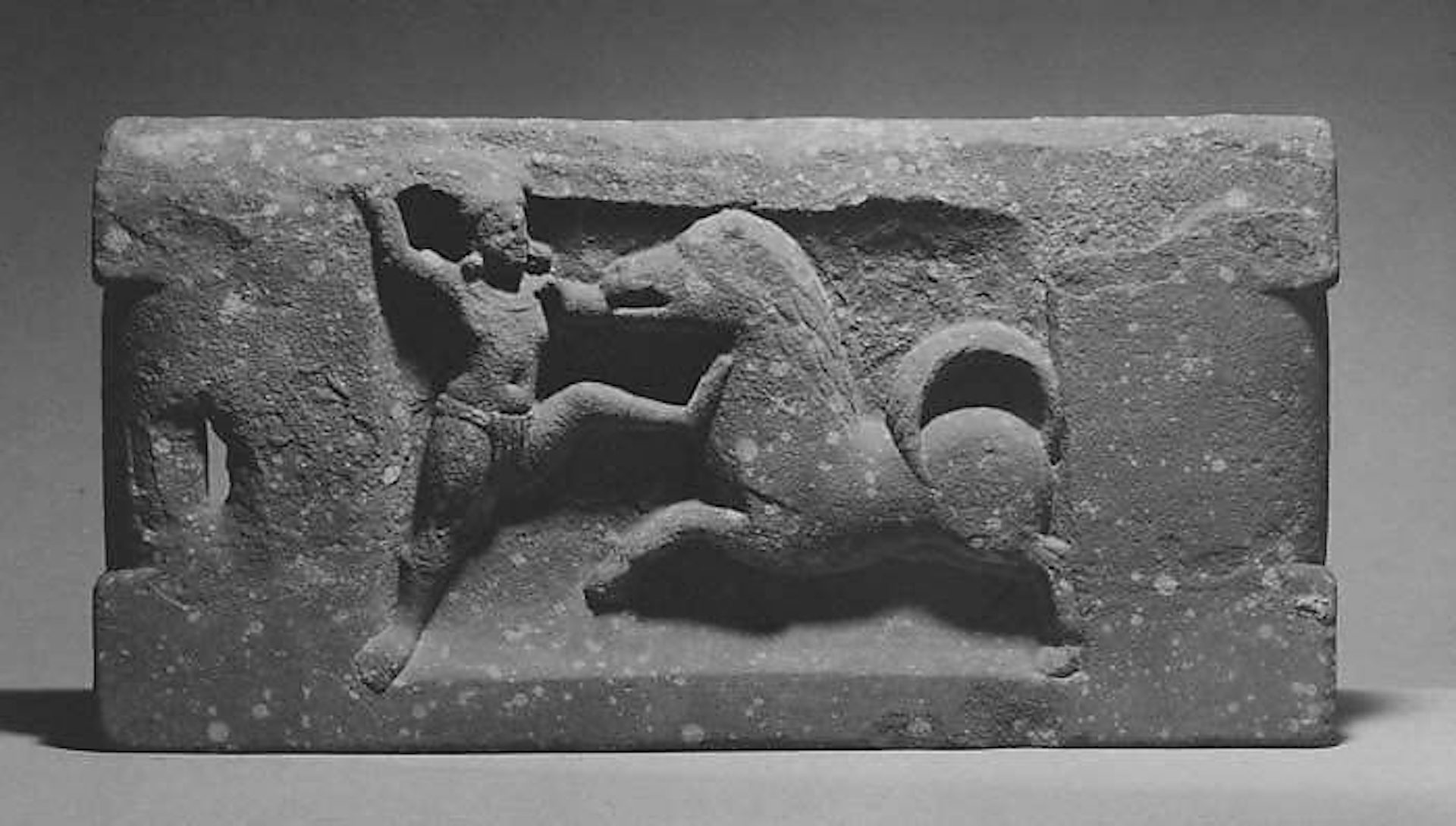 Bodybuilder weight depicting Krishna in battle with a horse demon, ca. 3rd century CE.