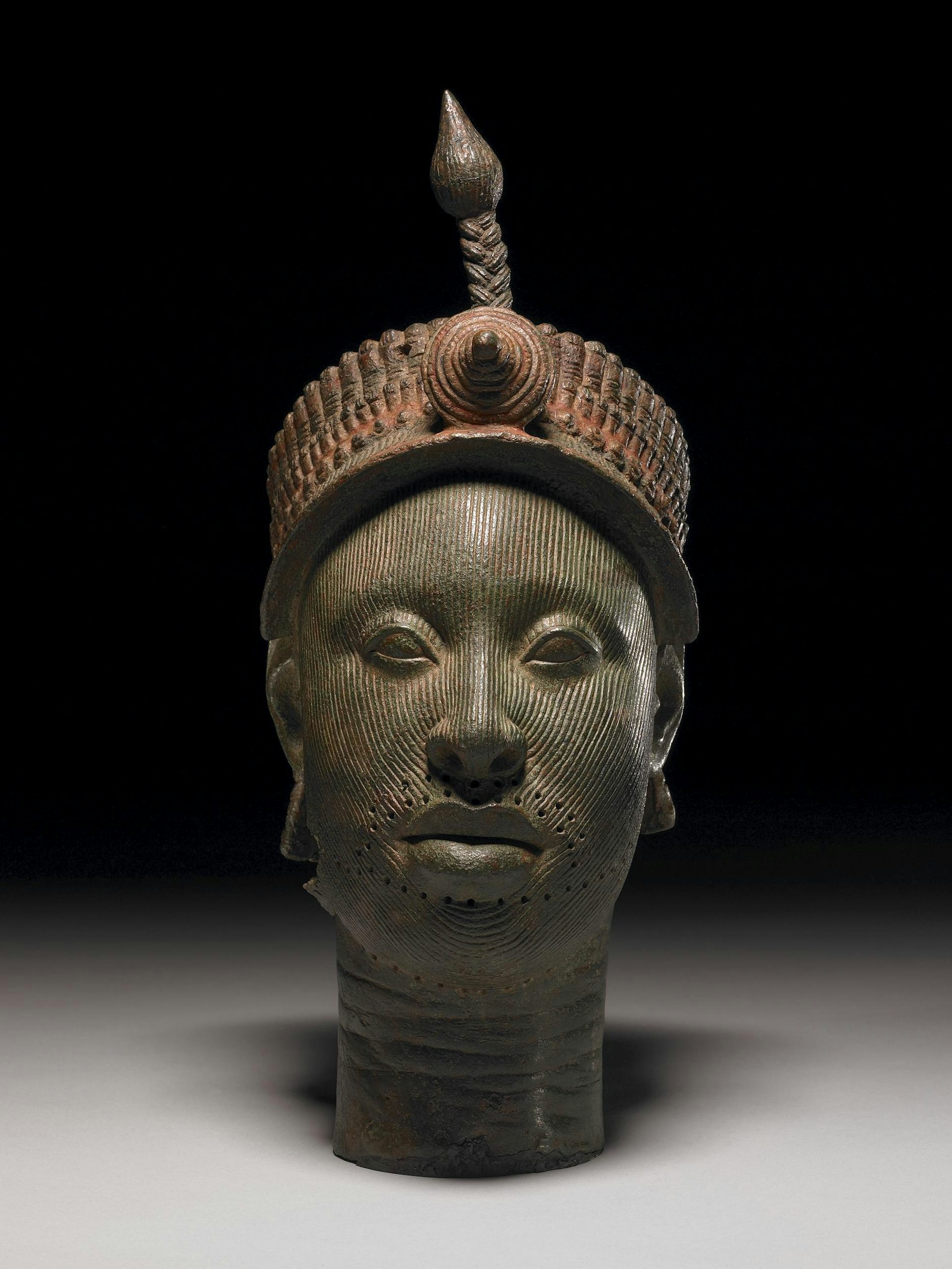 Brass Head of a Yoruba Ruler by Yoruba artist. (14th – 15th century).