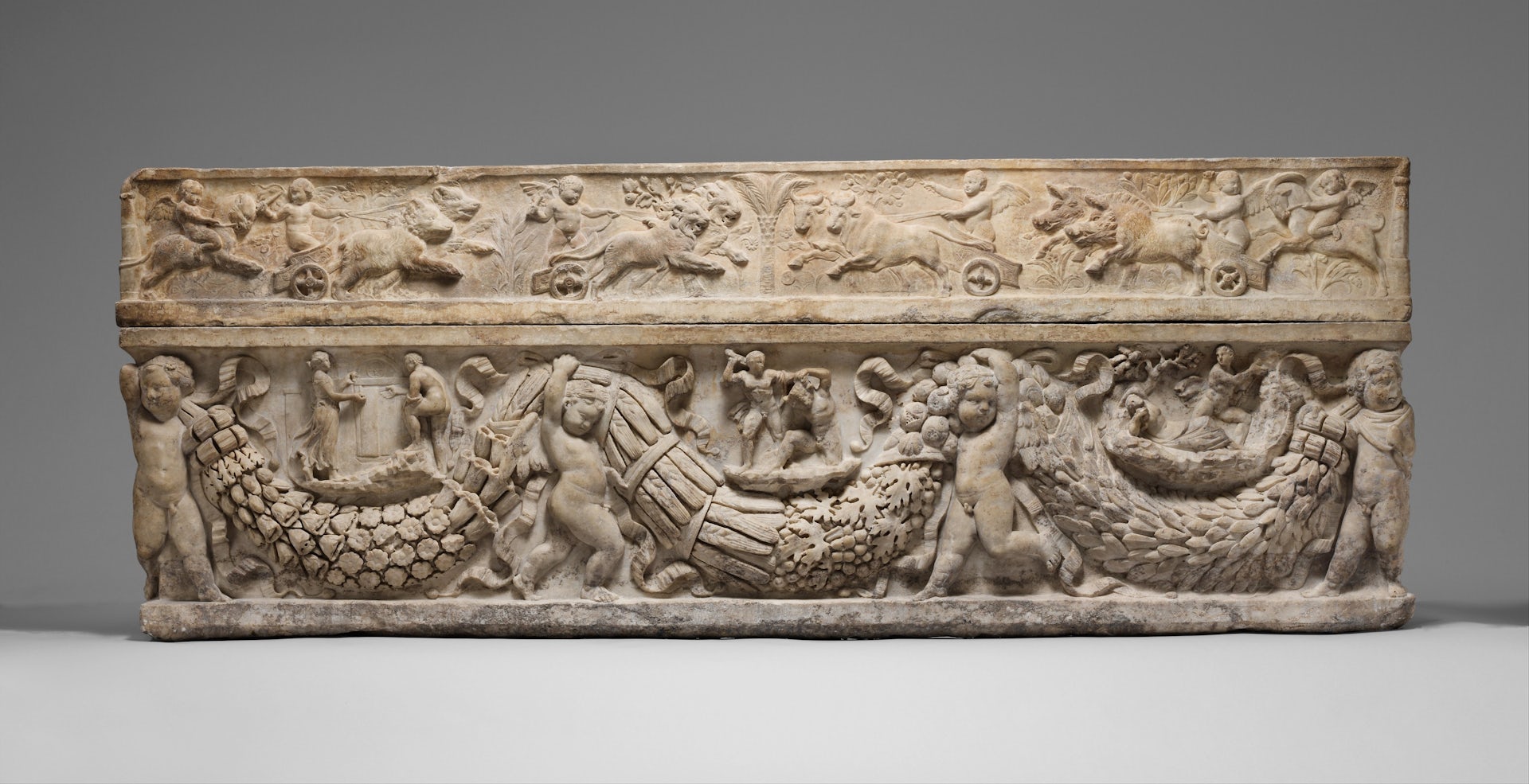Roman marble sarcophagus with garlands and the myth of Theseus and Ariadne