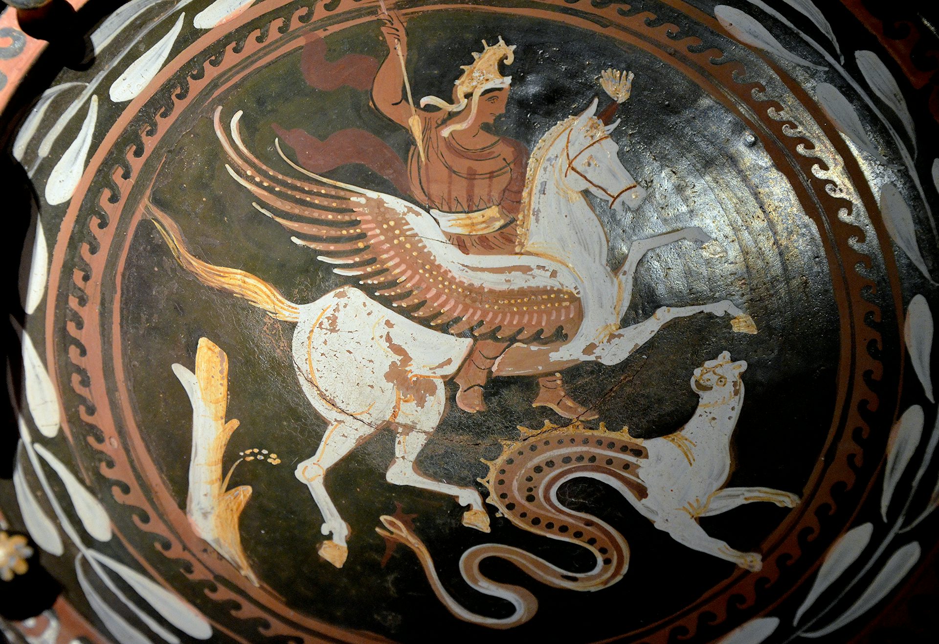 Plate showing Bellerophon riding Pegasus and a chimera, 4th century bce