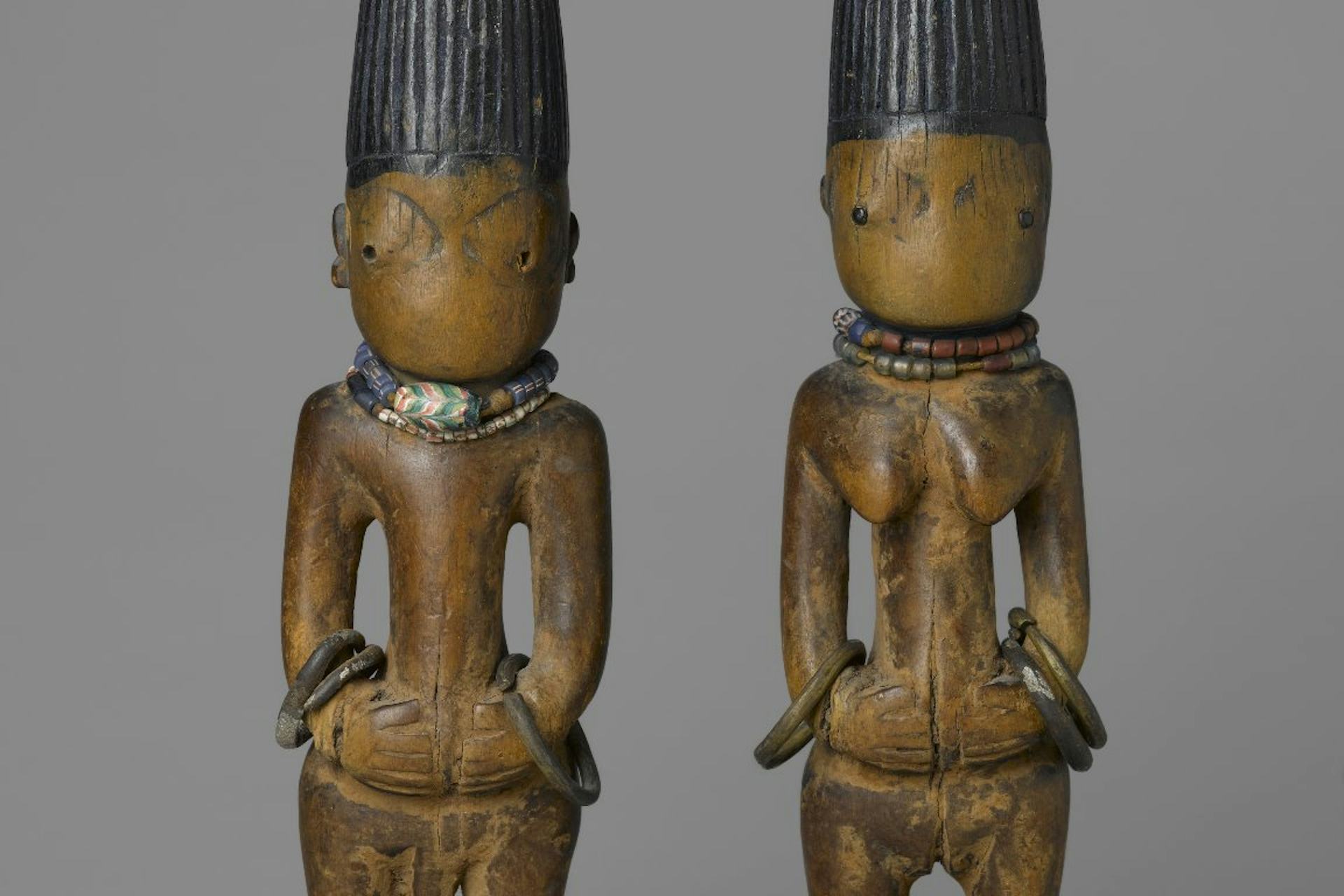 Pair of twin figures (Ère Ìbejì) by Yoruba artist (late 19th-early 20th century)