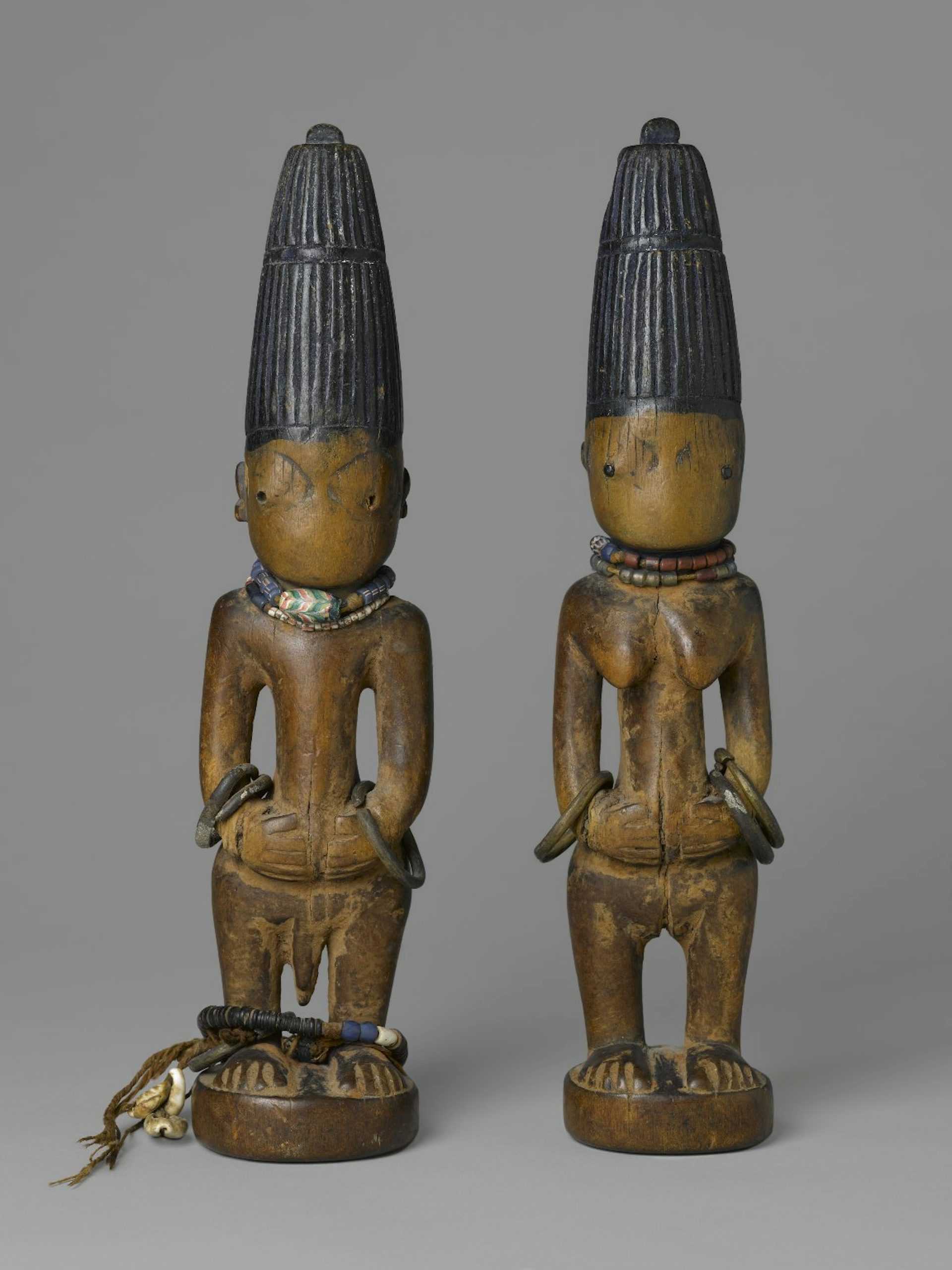 Pair of twin figures (Ère Ìbejì) by Yoruba artist (late 19th-early 20th century)