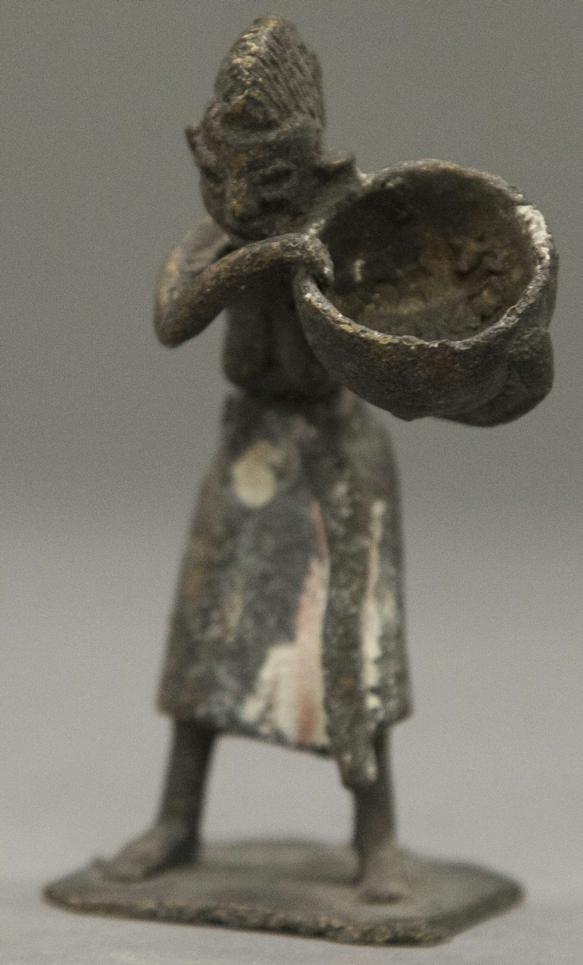 Figure of Standing Female Carrying Bowl by Fon artist, (19th century).