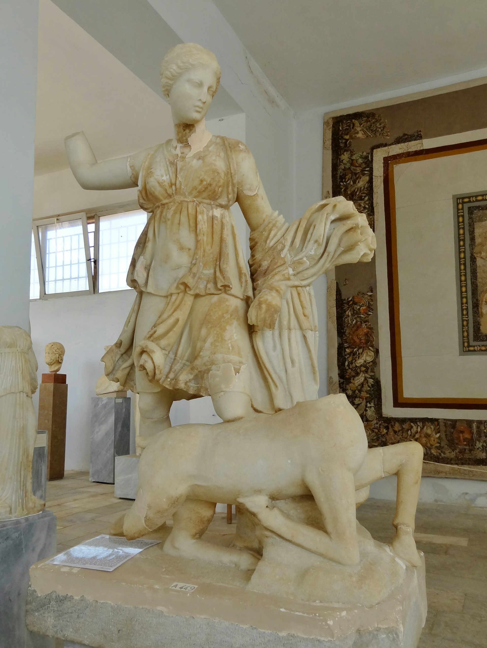 Statue of Artemis killing a deer