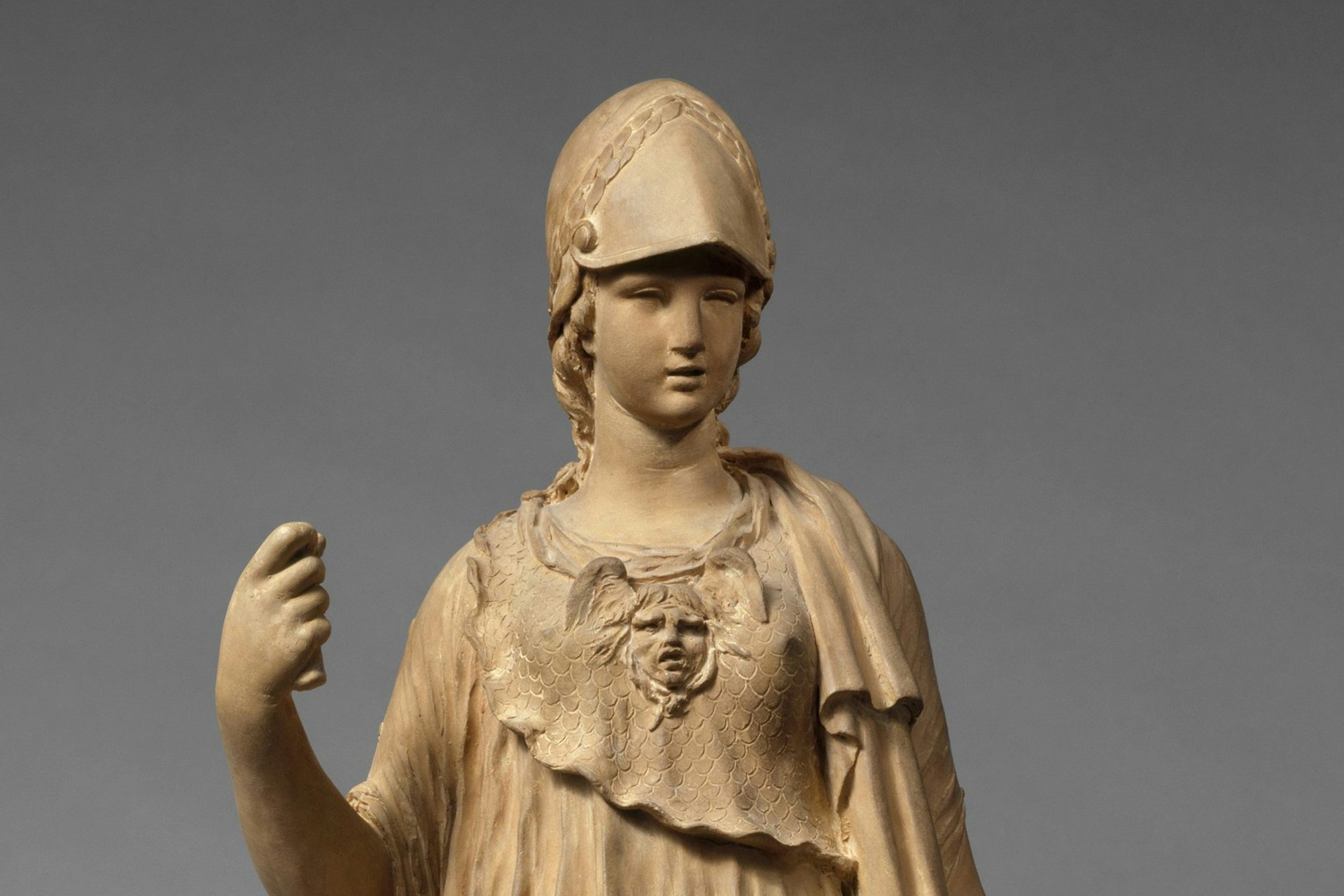 roman statue face god