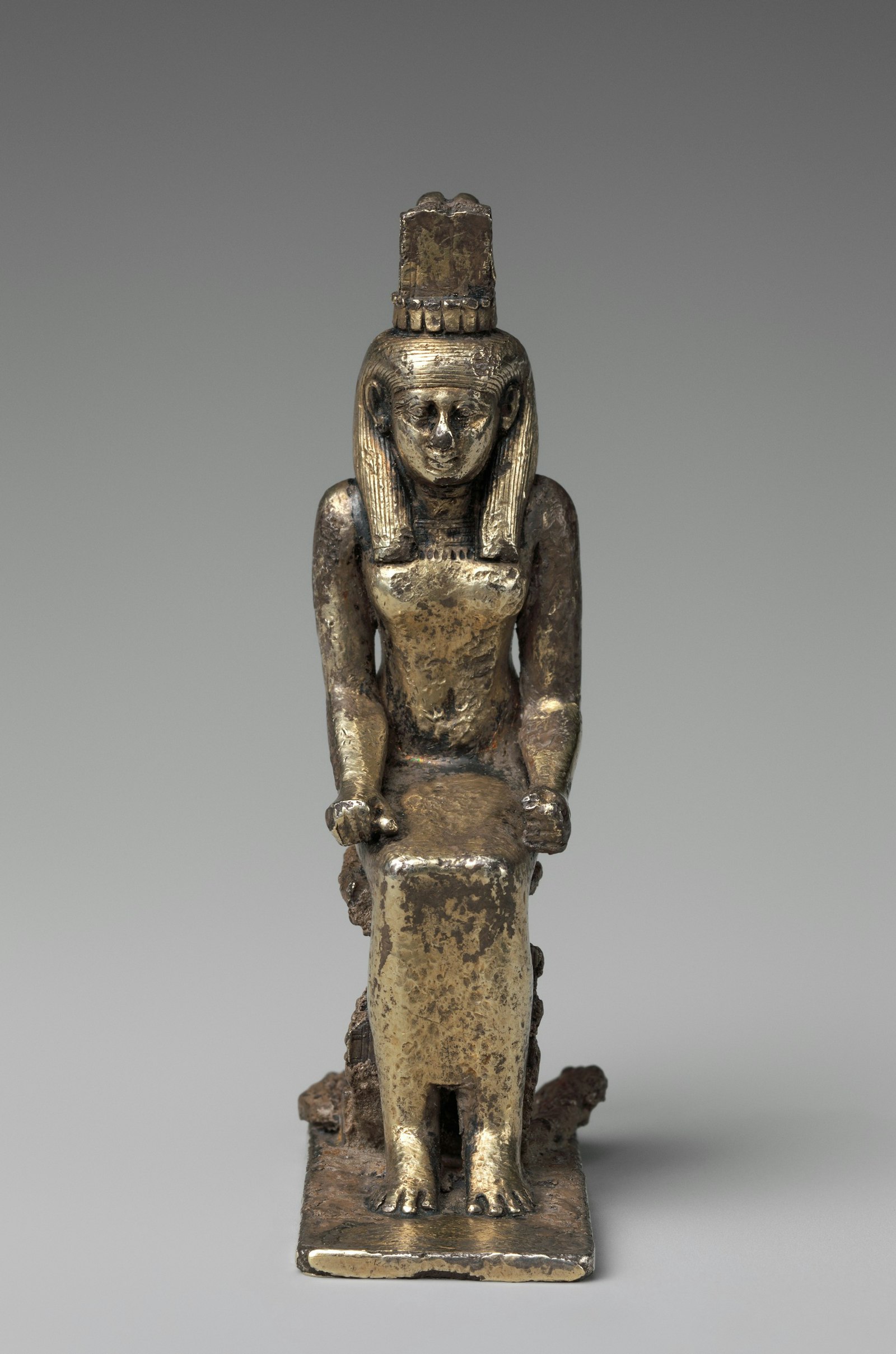 silver statue of a seated Nephthys