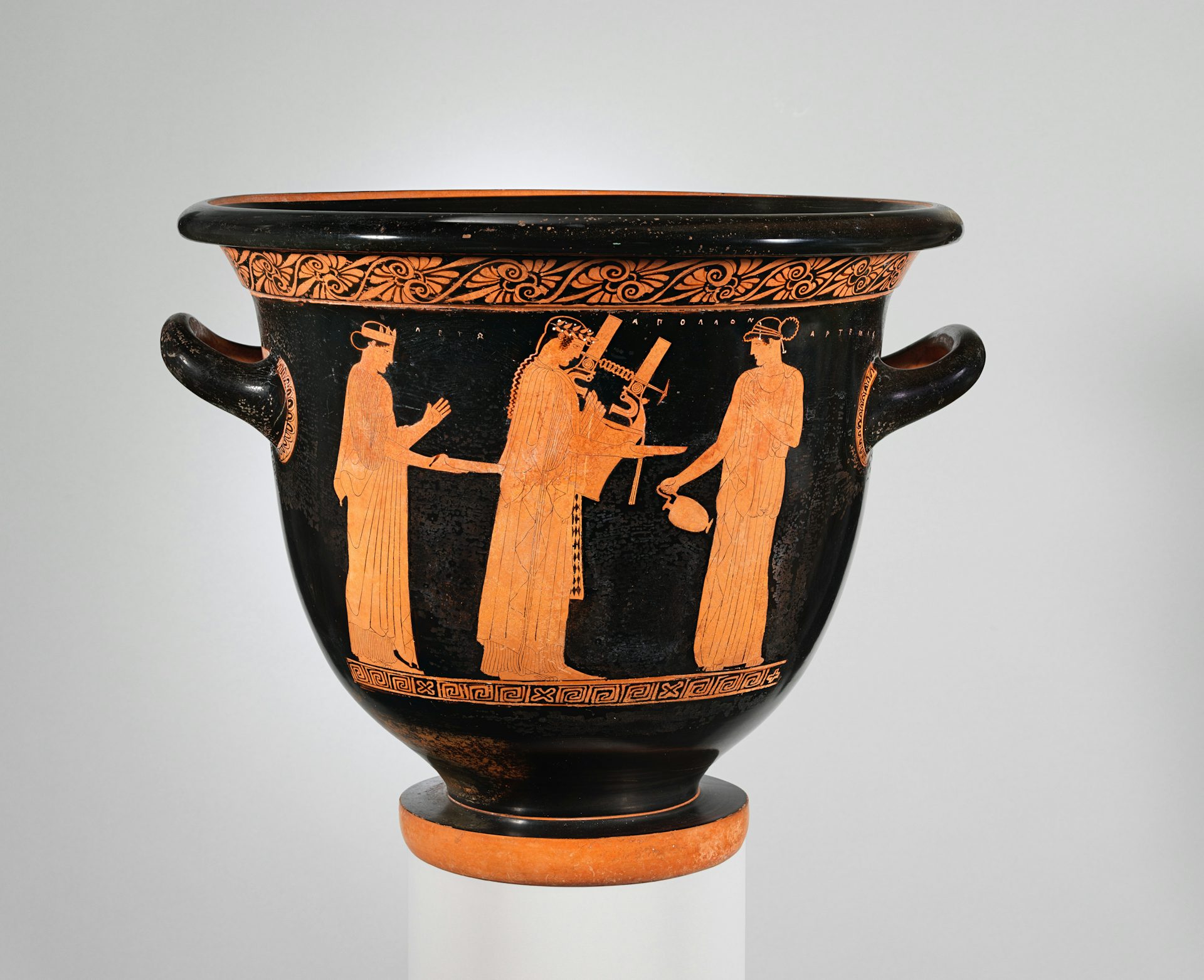 Terracotta bell-krater with Apollo between Leto and Artemis