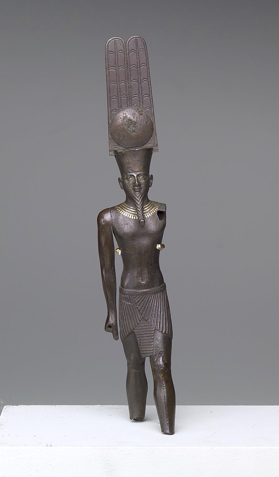 statue of Amun-Ra with crown of tall plumes