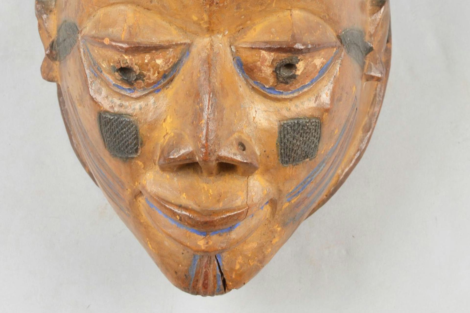 Wooden dance mask by Yoruba artist (pre-1908).